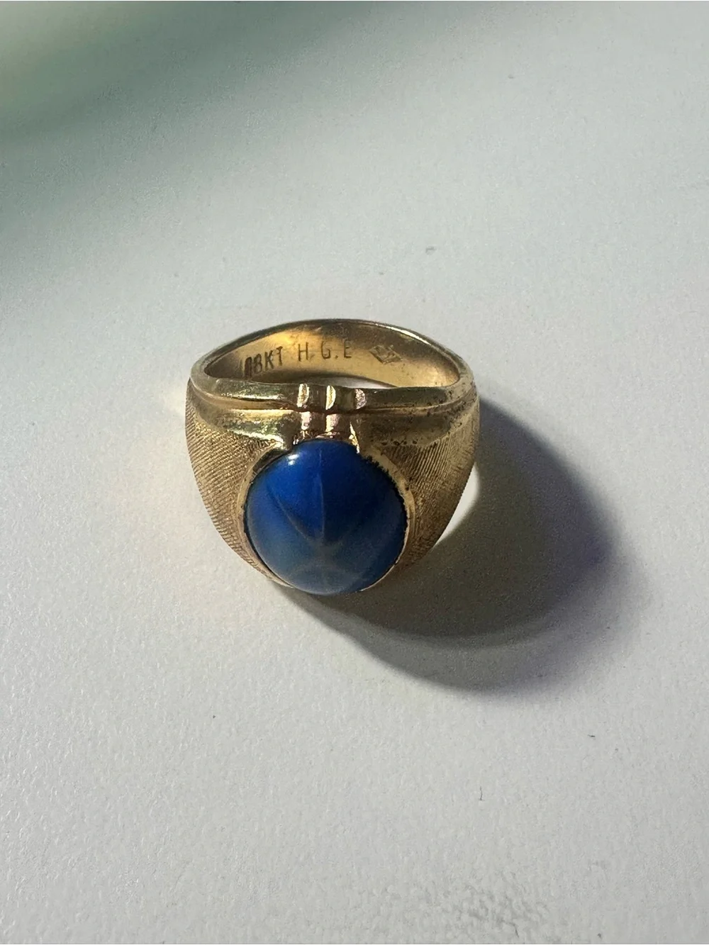 Gold-Tone electroplated size 7 Ring with Blue Oval sapphire men’st